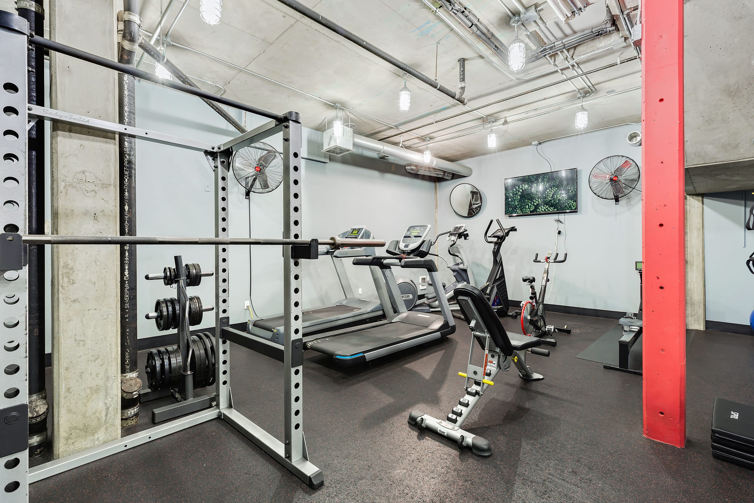 Gym at Site 17 condo building in Belltown, a Seattle neighborhood