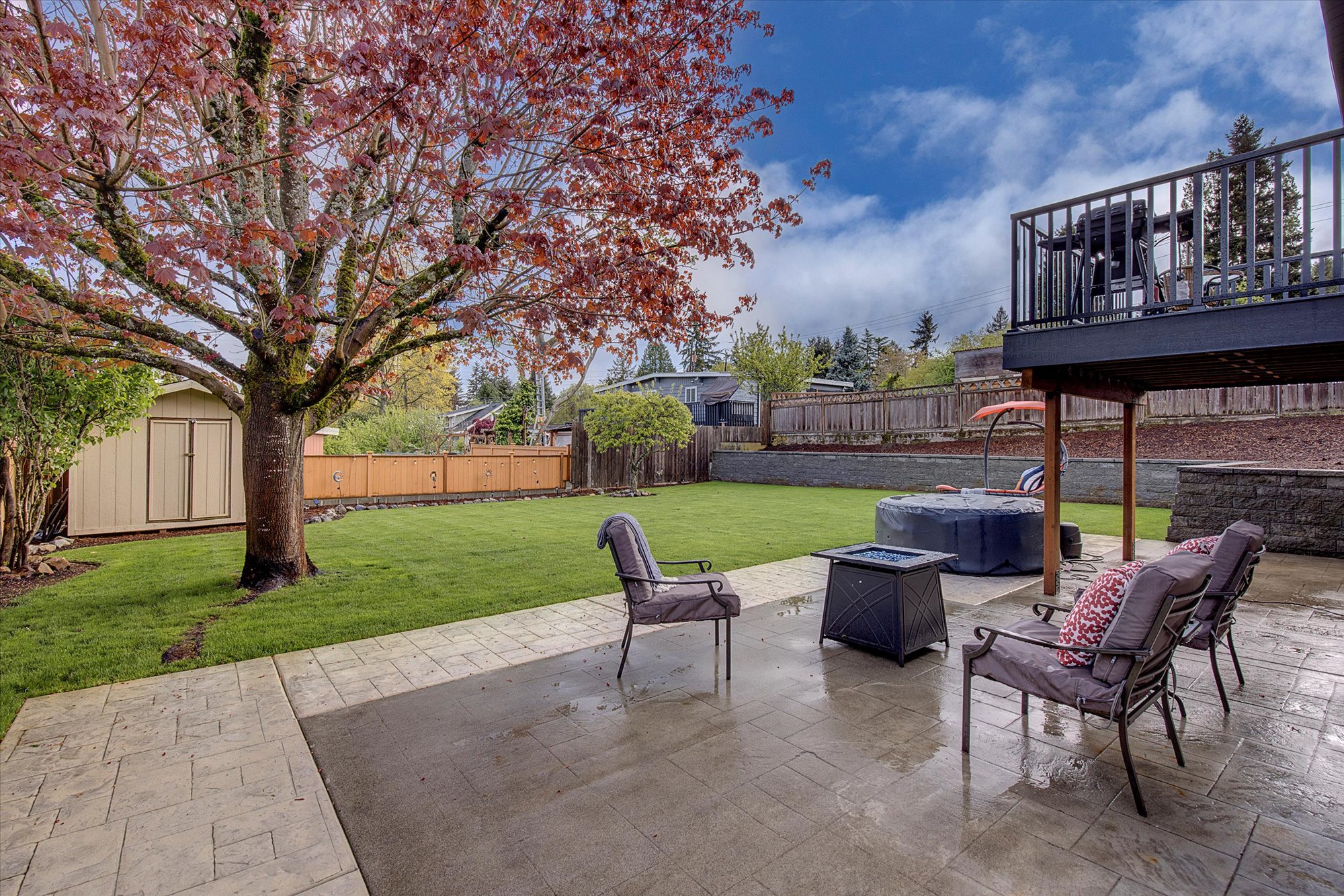 An affordable home in Seattle with a custom patio and yard